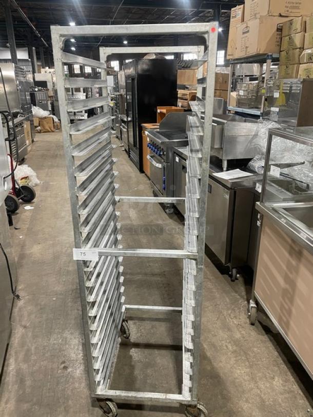 Commercial aluminum full-size heavy duty bun/sheet pan rack with multiple shelves, on casters, used condition.