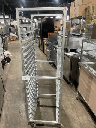 Commercial aluminum full-size heavy duty bun/sheet pan rack with multiple shelves, on casters, used condition.