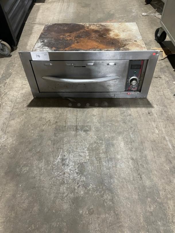 APW Wyott HDDi Series stainless steel warming drawer with thermostatic controls, Model HDDi-1-208-B-S, showing visible wear.