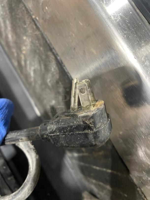 Glas Tender MF24B underbar glass chiller plug detail, showing power connection for commercial use. Stainless steel finish visible.