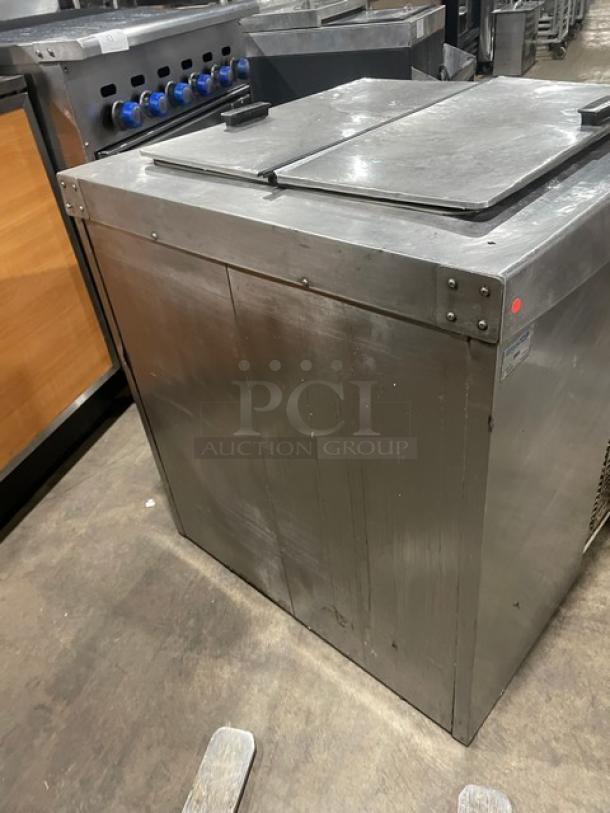 Master-Bilt DC-4DSE stainless steel ice cream dipping cabinet with flip lid and poly coated wired rack, 115V, used condition.