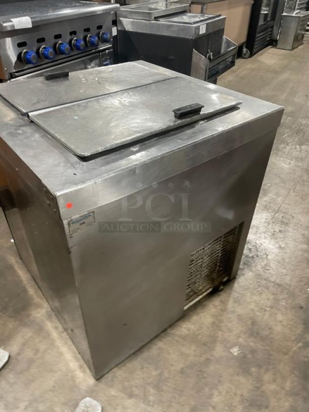 Master-Bilt DC-4DSE stainless steel ice cream dipping cabinet with flip lid, poly coated rack, and identifiable markings, 115V.