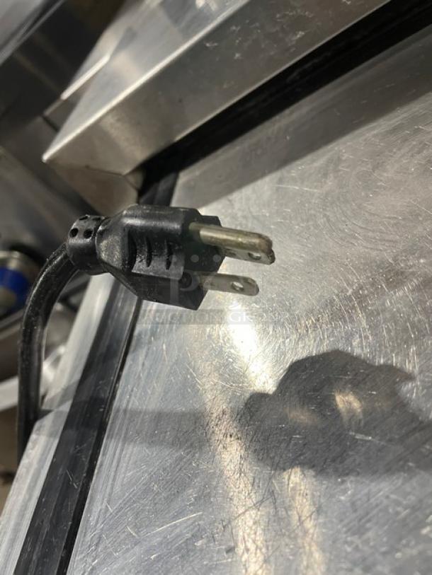 Master-Bilt DC-4DSE stainless steel ice cream dipping cabinet with flip lid, poly-coated wire rack, 115V plug shown.