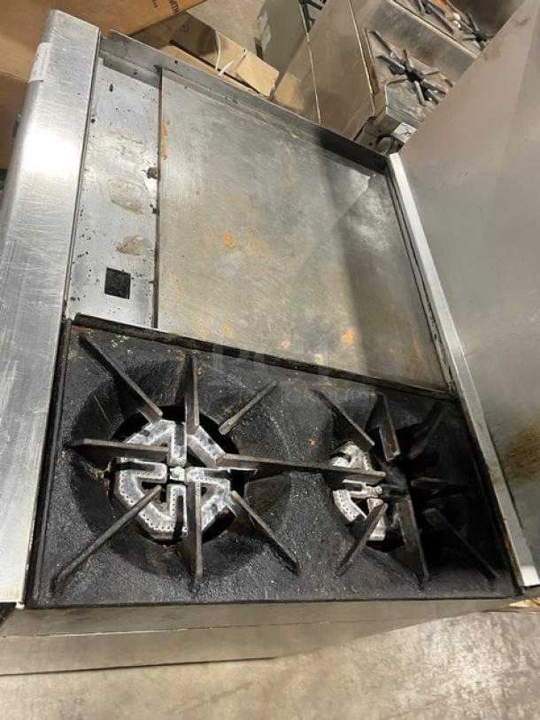 US Range commercial stainless steel 2-burner flat griddle range/oven combo with backsplash and overhead salamander shelf, on casters.