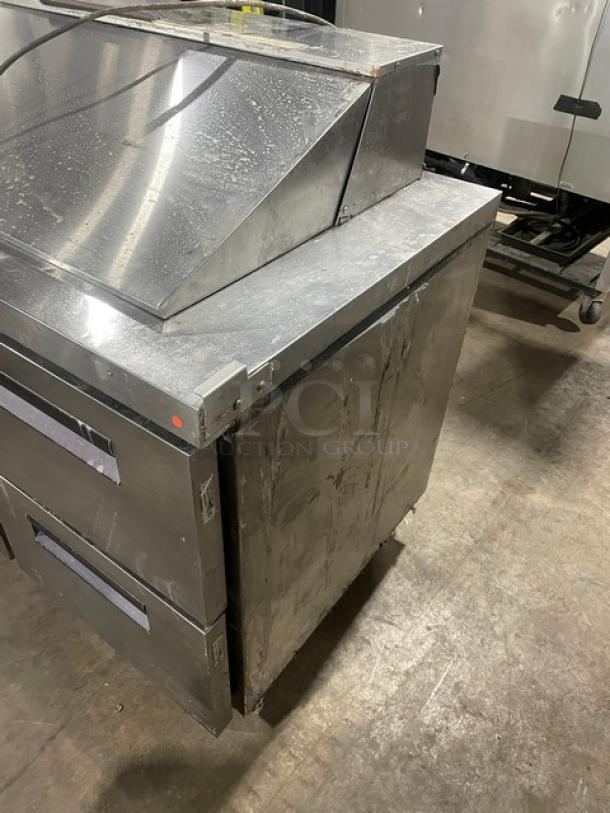 Hoshizaki stainless steel 4-drawer refrigerated prep table, Bain Marie style, visible wear, commercial use.