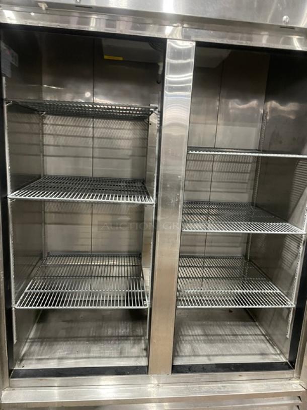 Asber APR49HF 2-door stainless steel reach-in refrigerator, features poly coated wire racks, on casters, 115V 1 Phase.