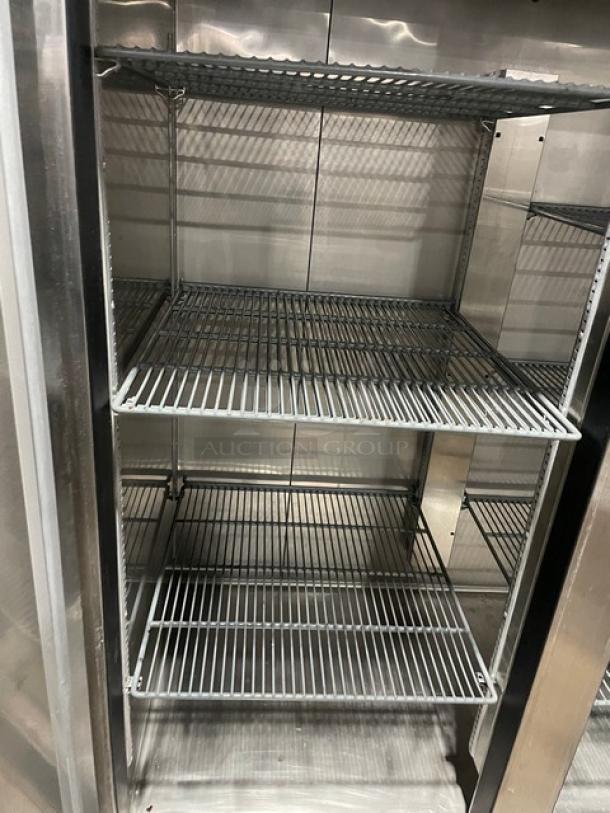 Asber APR49HF 2-door stainless steel reach-in refrigerator with poly coated wired racks, on casters, 115V, 1 Phase.