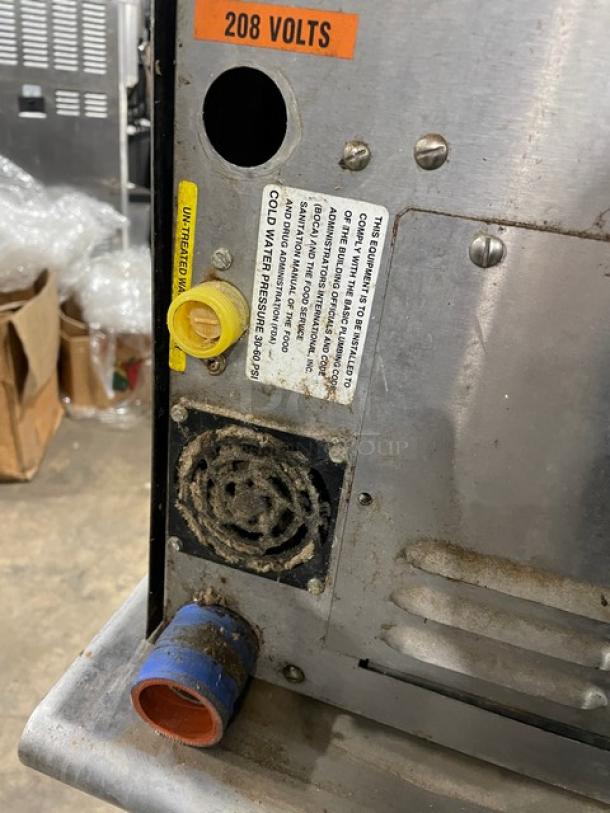 Groen Smart Steam 100 Series convection steamer, model SSB-3E. Visible labeling indicates 208 volts. Mounted on dual section equipment stand.