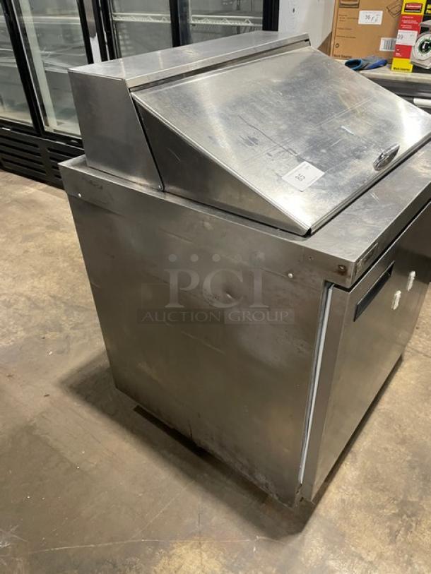 Delfield stainless steel Bain Marie style prep table with undercounter refrigerated base, model 4432N12M, on casters.