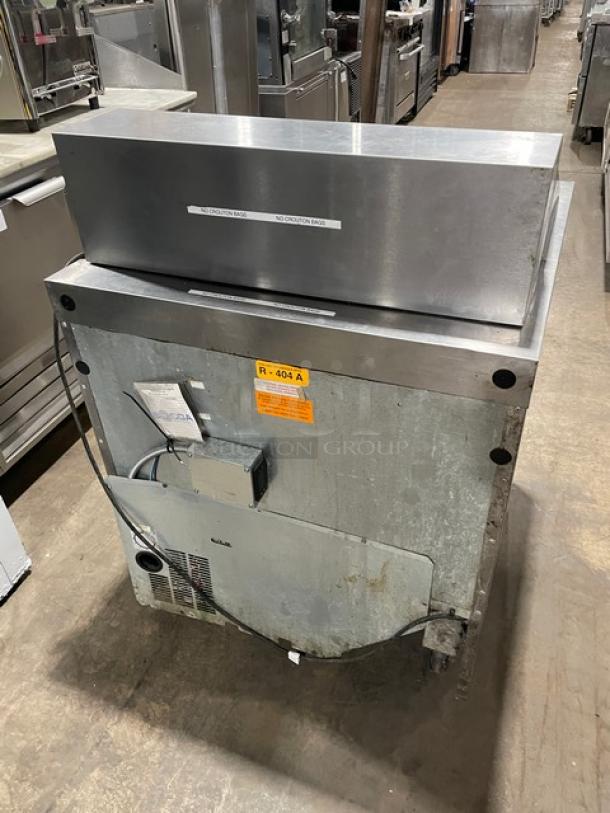 Delfield stainless steel salad/sandwich prep table, Model 4432N12M, with 1-door refrigerated base, on casters, 115V.