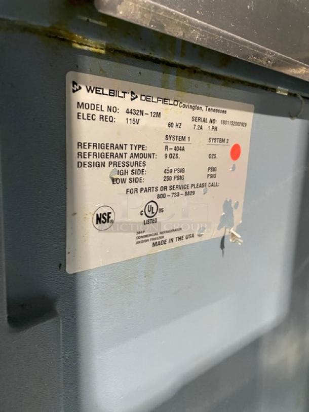 Delfield stainless steel Bain Marie style prep table, model 4432N-12M, with refrigerated base, on casters.