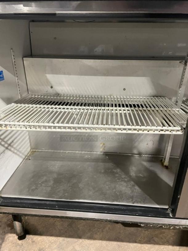 True TWT-60 stainless steel 2-door worktop refrigerator, Energy Star certified, poly coated wire rack, on casters, back splash.