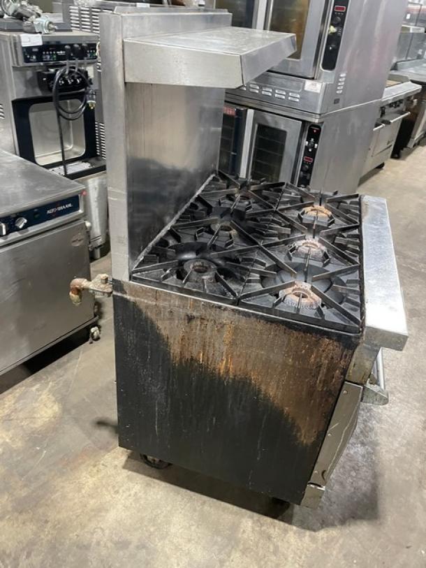 Vulcan 36L commercial 6-burner range with oven, stainless steel, natural gas, includes back splash, overhead salamander shelf, on casters.