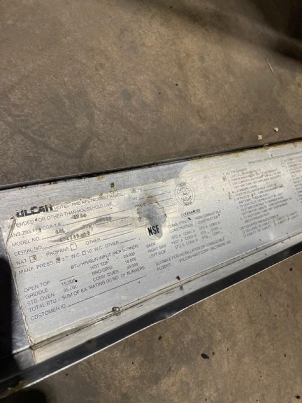 Vulcan stainless steel 6-burner range/oven combo, model 36L, features overhead salamander shelf, casters, and NSF certification tag.