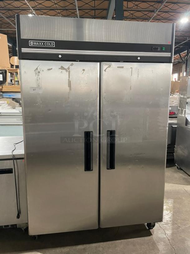 Maxx Cold commercial stainless steel 2-door reach-in freezer, model MXCF49FD, on casters, with poly coated rack.
