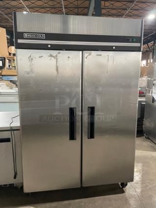 Maxx Cold commercial stainless steel 2-door reach-in freezer, model MXCF49FD, on casters, with poly coated rack.