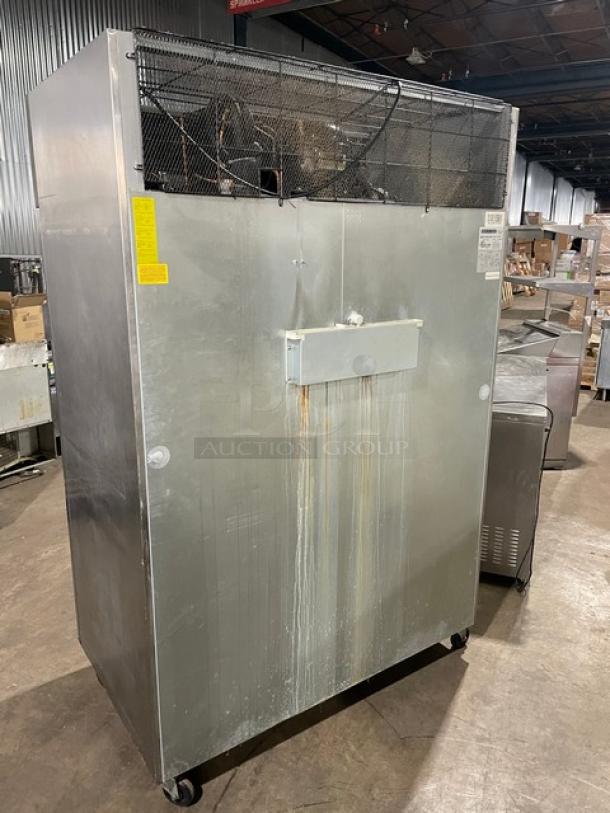 Maxx Cold commercial stainless steel 2-door reach-in freezer, model MXCF49FD, on casters, with poly-coated wired rack.