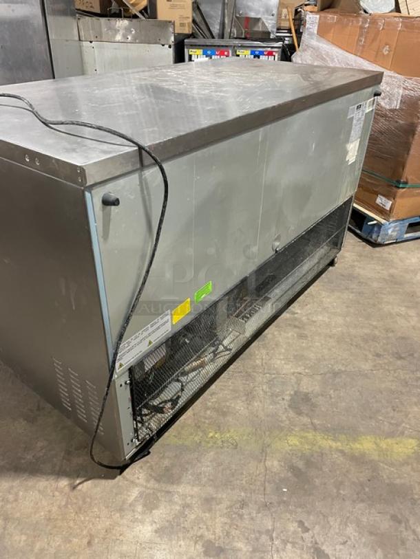 Arctic Air AUC60RZ 2 Door Lowboy Cooler, stainless steel, poly coated rack, 115V, on casters, SN: H22055130, used.