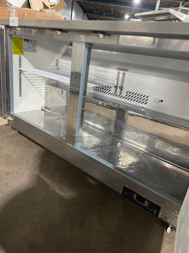 Arctic Air AUC60RZ stainless steel 2-door cooler, poly coated rack, on casters, 115V, commercial use.