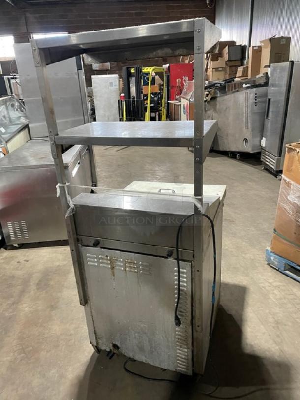 Continental DW27-12M stainless steel prep table, bain marie style, refrigerated base, dual section overhead shelf, cutting board.