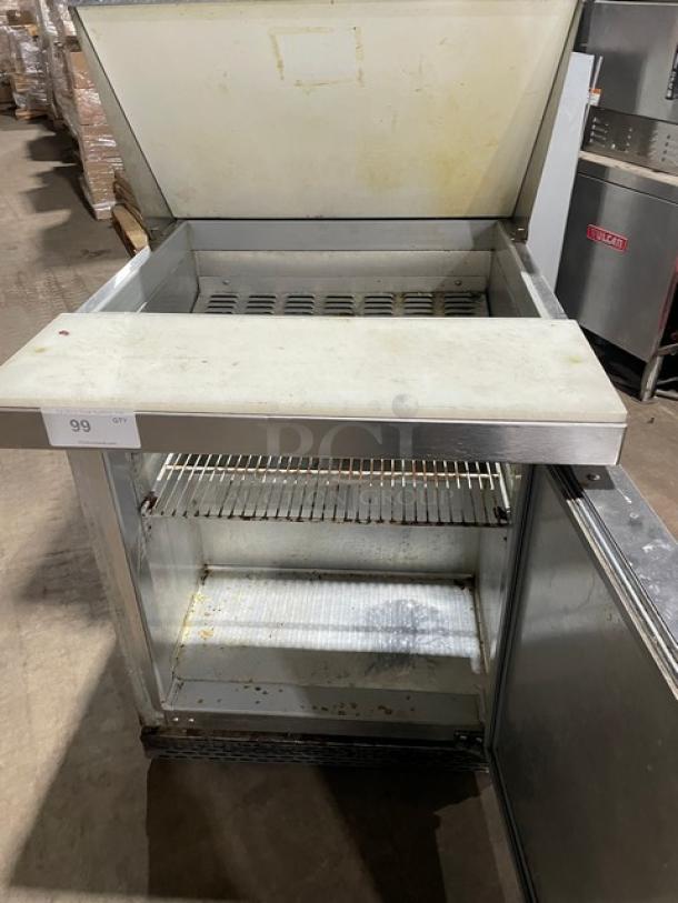 Continental DW27-12M stainless steel bain marie prep table with refrigerated base, cutting board, and dual-section shelf.