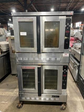 Blodgett commercial stainless steel gas double-stacked convection oven with solid state control, wired rack, on casters.
