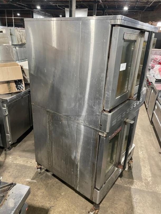 Blodgett double-stacked stainless steel gas convection oven, solid state control, wired rack, on casters, used condition.