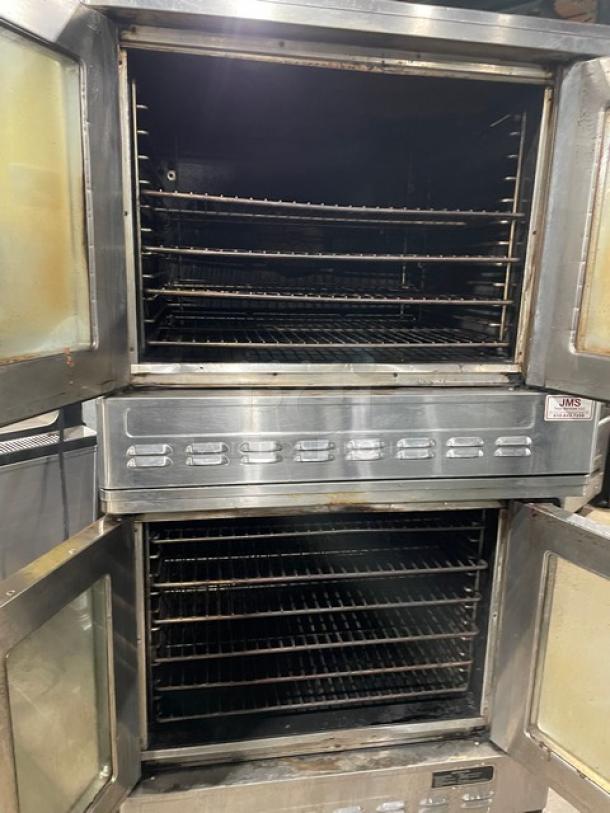 Blodgett stainless steel double-stacked gas convection oven with solid state control, wired racks, on casters.
