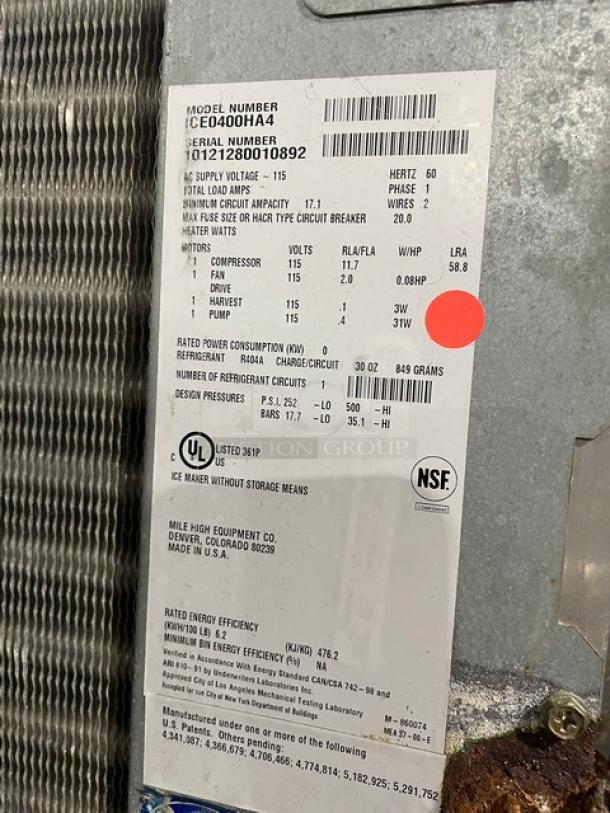 Ice-O-Matic ICE0400HA4 ice maker tag showing model, serial number, and specifications including 115V, 1 phase, and UL/NSF certifications.