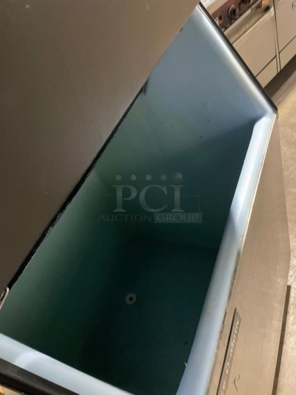 Ice-O-Matic ICE0400HA4 commercial ice machine, stainless steel, open bin, air-cooled, electric-powered, 115V, on legs.