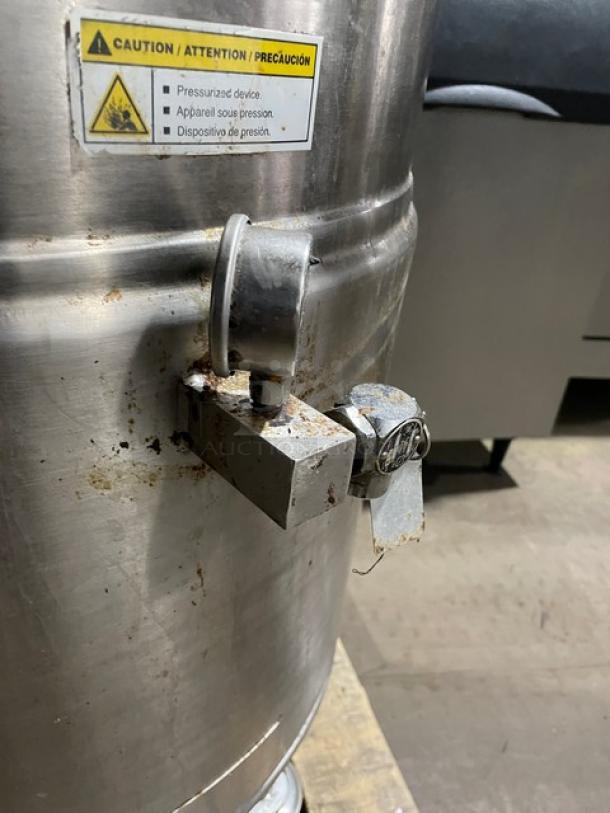 Cleveland Range KEL40 stainless steel steam kettle, 40 gal capacity, electric, stationary on legs, visible wear, caution label.