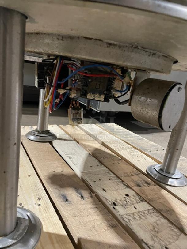 Cleveland Range KEL40 stainless steel steam jacketed kettle, 40 gal. capacity, electric powered, on legs, visible wiring.