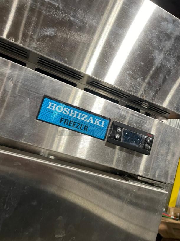 Hoshizaki Commercial Stainless Steel Solid 2 Door Reach-In Freezer, Model F2A-FS, featuring poly coated wired rack, 115V 1 Phase.