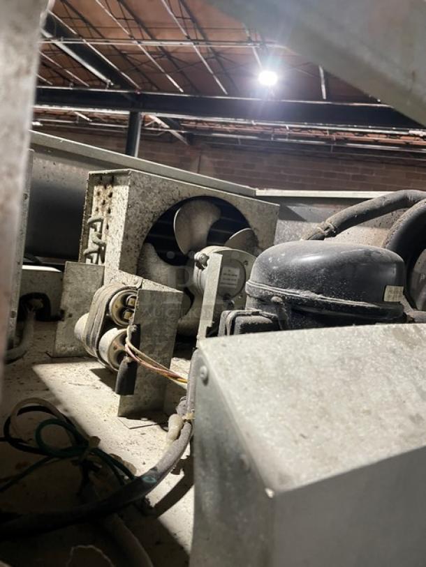 Turbo Air M3 Series Reach-In Refrigerator, Model M3R24-2, internal components view, showing motor and wiring.