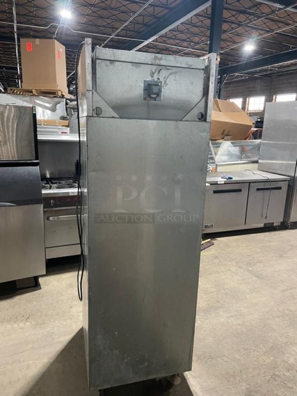 Delfield 6000-XL Series stainless steel reach-in freezer, single solid door, on casters, includes poly coated wire rack.