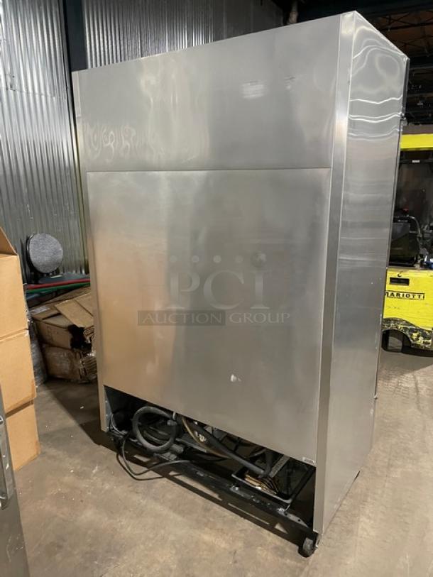 True T-49F-4 commercial stainless steel reach-in freezer, half-door, double section, on casters, 115V 1 Phase.