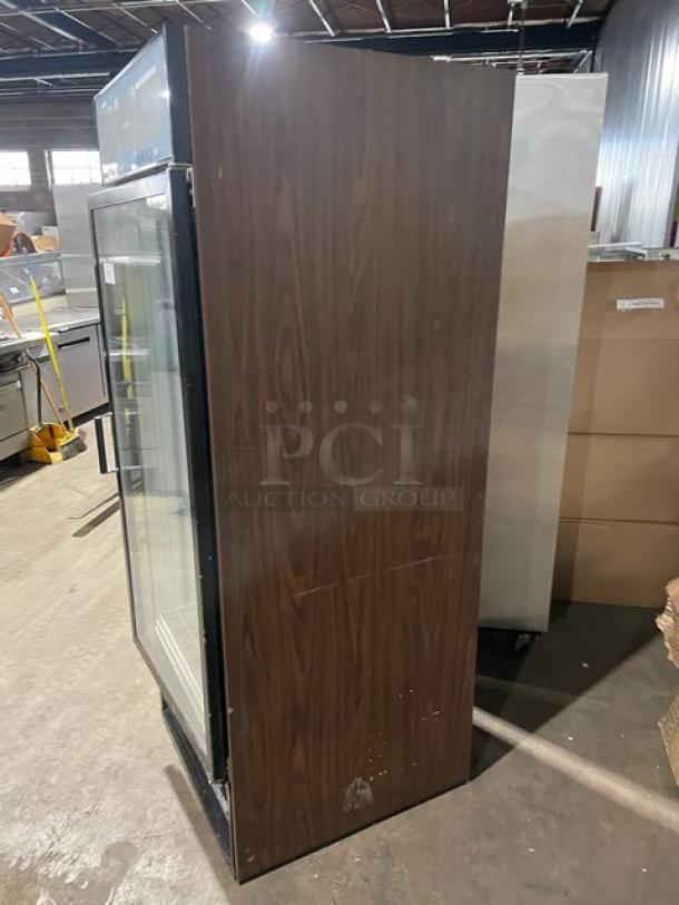 Beverage-Air MT27 commercial refrigerator, black, single glass swing door, poly-coated wire rack, used condition.
