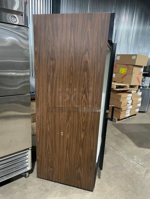 Beverage-Air MT27 black single glass swing door merchandiser refrigerator with poly-coated wire rack, model MT27, SN: 3215140, 115V 1 Phase.