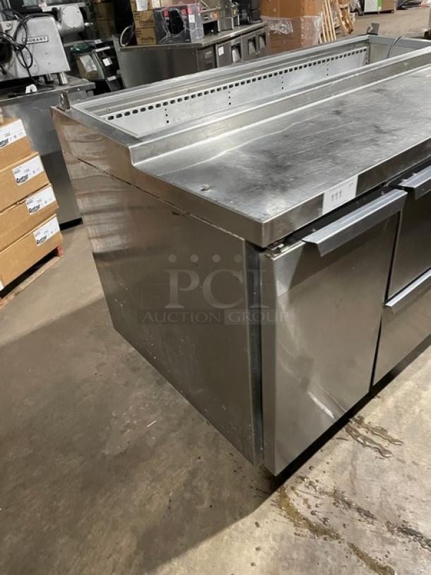 Continental stainless steel prep table with single door and three drawers, poly-coated rack, on casters; solid condition.