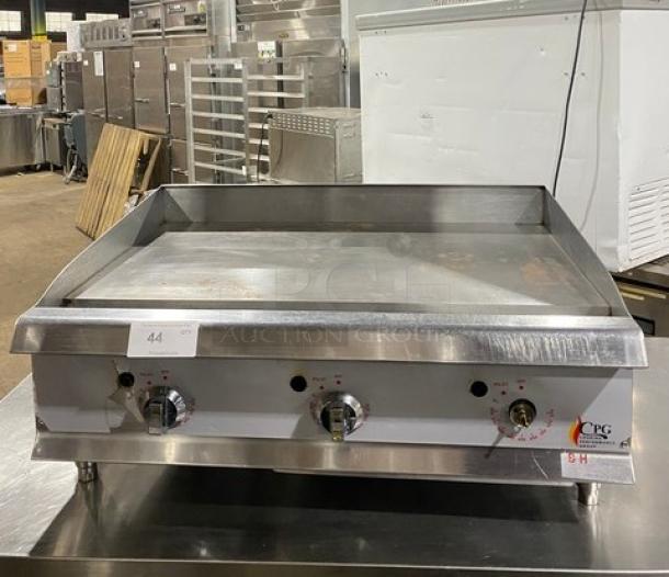 CPG Commercial Stainless Steel Gas Flat Griddle with thermostatic controls, back and side splash, and sturdy legs.