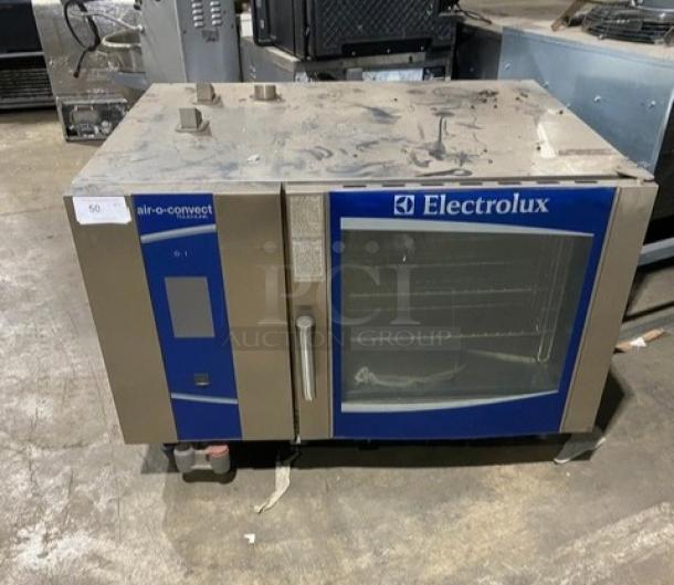Electrolux Air-O-Convect commercial combi oven, model AOS062GKP1, stainless steel, natural gas, touch controls, on legs.
