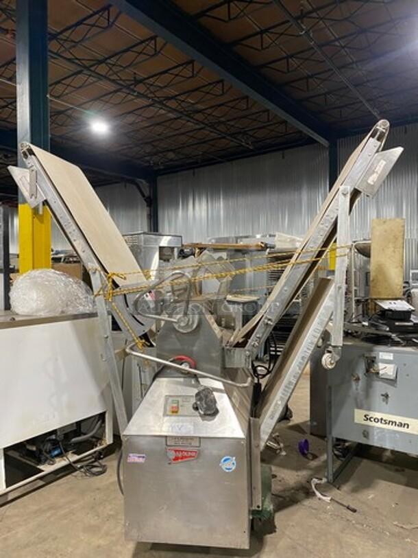 Moline commercial electric dough sheeter/molder, freestanding, reversible, used condition, controls visible, stainless steel.