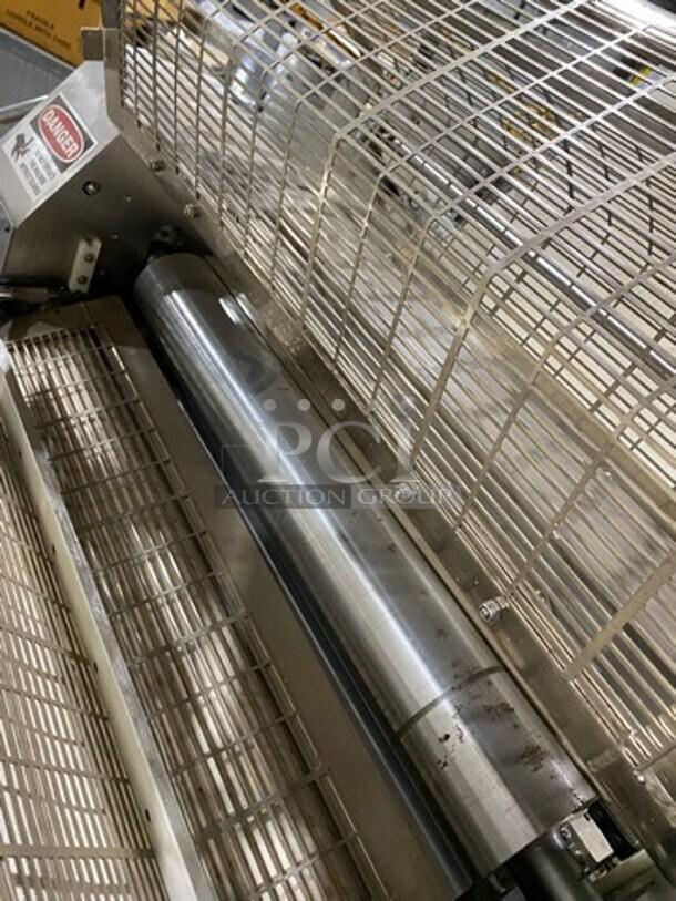 Moline commercial electric reversible dough sheeter/molder, stainless steel, freestanding, protective grates, working condition.