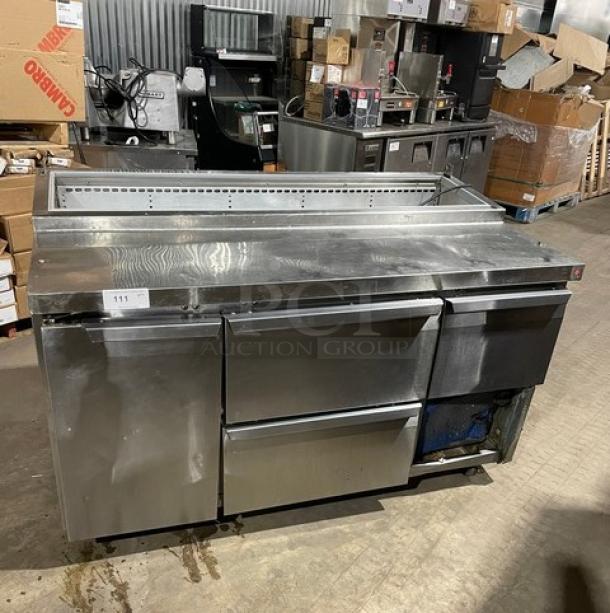 Continental stainless steel prep table with solid door, 3 drawers, poly coated rack, and casters; commercial-grade.