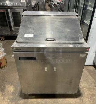Delfield stainless steel bain marie-style prep table, model 4432N12M, with undercounter fridge, SN 1801152002929, on casters.