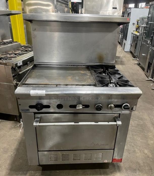 US Range commercial stainless steel 2-burner griddle range/oven combo with backsplash, overhead salamander shelf, and casters.