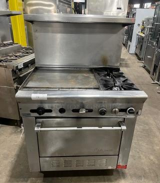 US Range commercial stainless steel 2-burner griddle range/oven combo with backsplash, overhead salamander shelf, and casters.