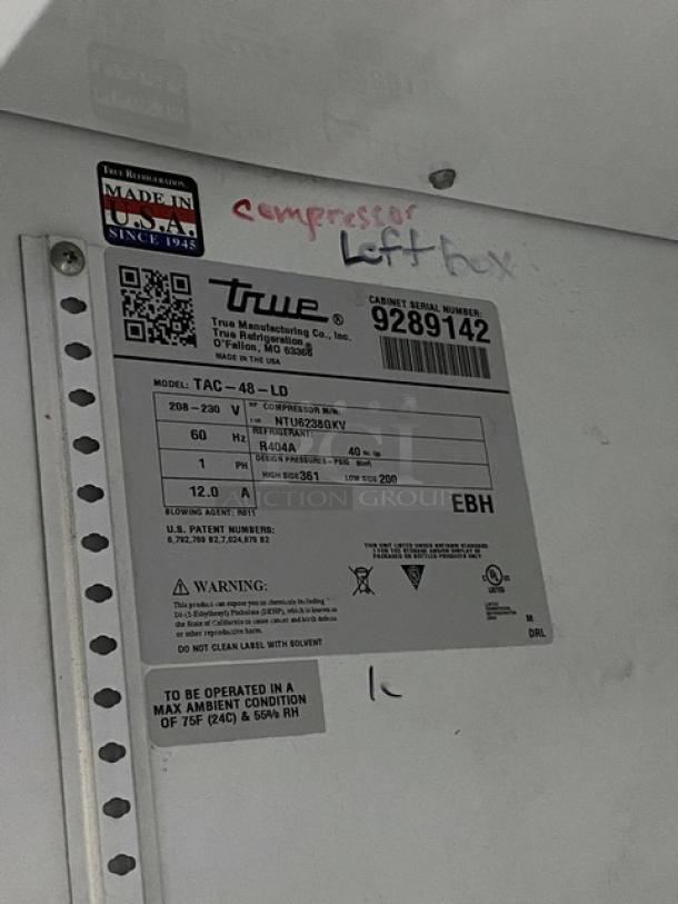 True TAC48LD Refrigerated Merchandiser Display Case, stainless steel, adjustable racks, serial number 9289142, Made in USA, 208-230V.