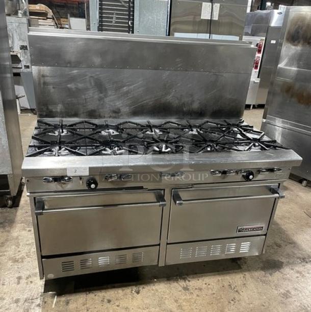 Garland H284 stainless steel 10-burner range with double oven, backsplash, wired rack, and casters. Natural gas powered.
