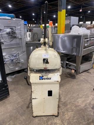 Benier heavy-duty floor dough divider/rounder in used condition, 220V. Visible wear, Benier logo on front.